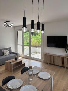 TV/trung tâm giải trí tại Appartement neuf avec parking