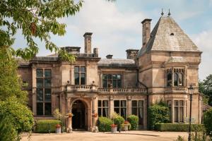 an old stone house with a turret at Rookery Hall Hotel & Spa in Nantwich