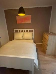 Llit o llits en una habitació de Team LILO