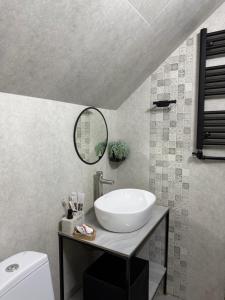 a bathroom with a white sink and a mirror at Debed View in Debed +55 photos