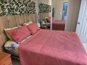 En eller flere senge i et værelse på Playa y arena