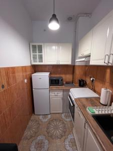 Nhà bếp/bếp nhỏ tại Home & Pool Apartment +11 ảnh