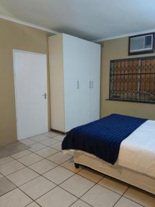 En eller flere senge i et værelse på The Glen House