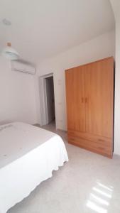 Postel nebo postele na pokoji v ubytování Dimora del Centro + 12 fotografií