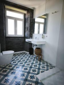 Et badeværelse på Cá Por Casa Pico-Vinhático