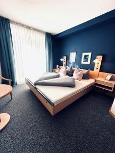 Postel nebo postele na pokoji v ubytování Gästehaus Germania