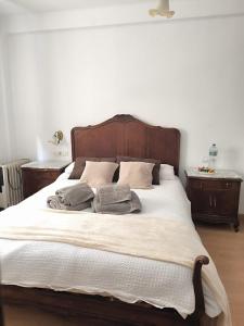 Giường trong phòng chung tại Julia Home, habitaciones en casa de un particular