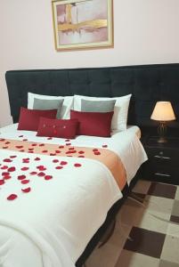 Postel nebo postele na pokoji v ubytování Gisenyi Short and Long Stay