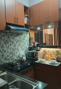 Kuchyň nebo kuchyňský kout v ubytování Gisenyi Short and Long Stay