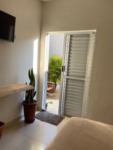 Et tv og/eller underholdning på Pousada Mariana