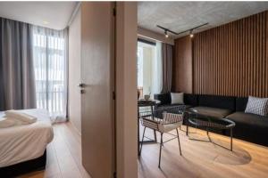 En eller flere senge i et værelse på Shantir Appartement