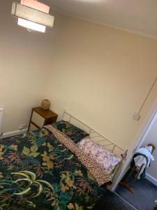 Postel nebo postele na pokoji v ubytování Atherstone Hideaway