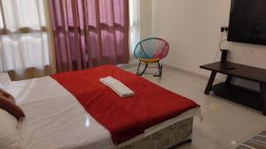 Ένα ή περισσότερα κρεβάτια σε δωμάτιο στο Texico Alkhuwir Muscat