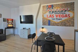 TV a/nebo společenská místnost v ubytování SC6 - Studio familial - Enghien gare - Lac & centre ville à pied