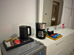 Kuchyň nebo kuchyňský kout v ubytování Bella INN - Deluxe Master rooms with Balcony - No Smoking