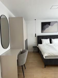 En eller flere senge i et værelse på Apartman Toma