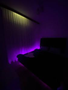 En eller flere senge i et værelse på Apartment Gostivar