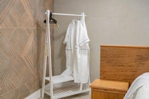 En eller flere senge i et værelse på Atalaia SPA 1 Qto c/ Hidro by Achei Camboriú + 37 billeder