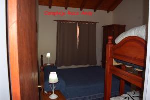 En eller flere senge i et værelse på Complejo Ruca Anay (Casa de amigos) + 21 billeder