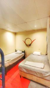 En eller flere senge i et værelse på Sea Garden Mizata + 11 billeder