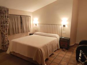 Postel nebo postele na pokoji v ubytování Finca Cerro Verde