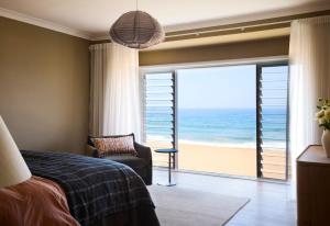 Postel nebo postele na pokoji v ubytování The Upper House