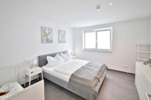 Postel nebo postele na pokoji v ubytování FeWo D&Y