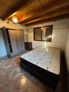 Giường trong phòng chung tại El Corte Refugio Natural