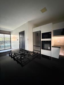 Nhà bếp/bếp nhỏ tại Jeanael suites 2