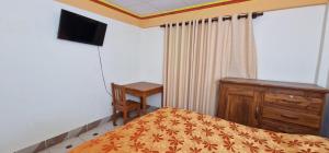 Μια τηλεόραση ή/και κέντρο ψυχαγωγίας στο Hotel Puesta de Sol +19 φωτογραφίες