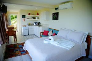 Η κουζίνα ή μικρή κουζίνα στο Memwa Villas +14 φωτογραφίες