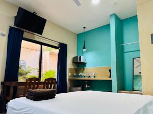 Кровать или кровати в номере Ceremonial Tulum