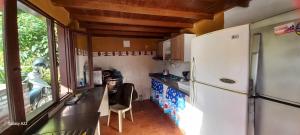 Kuchyň nebo kuchyňský kout v ubytování Casa de Campo MA