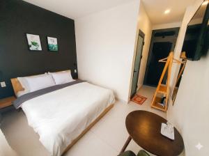 Postel nebo postele na pokoji v ubytování Hello Dalat Hostel