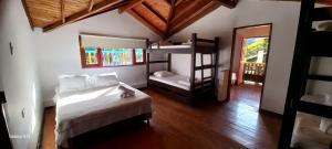 a bedroom with a bed and a bunk bed at Finca y Chalet MA in Chiquinquirá +49 photos