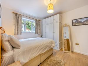 Postel nebo postele na pokoji v ubytování Amaranth