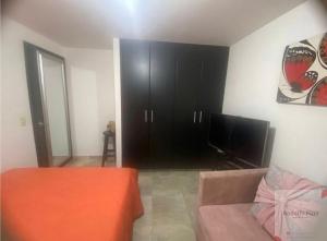 En eller flere senge i et værelse på Espectacular Habitacion