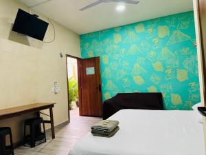 Телевизор и/или развлекательный центр в Ceremonial Tulum