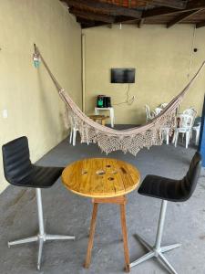 TV a/nebo společenská místnost v ubytování Casa Studio com piscina