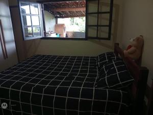 En eller flere senge i et værelse på Doce lar