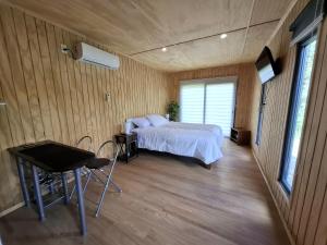 Ένα ή περισσότερα κρεβάτια σε δωμάτιο στο Casa Curamavida