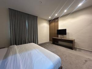 Et tv og/eller underholdning på Kana Apartments