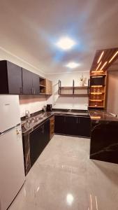 Køkken eller tekøkken på Luxury Apart