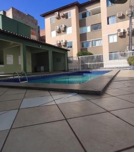 Swimmingpoolen hos eller tæt på Apto Gran Village a 4km da Litorânea e 2k do Shopping