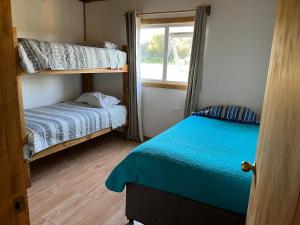 En eller flere senge i et værelse på Brisas Volcanicas