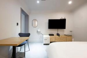 Et tv og/eller underholdning på Cheongju Hotel Persona