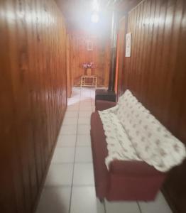 En eller flere senge i et værelse på Hostales Temuco - Plaza Dreves