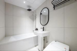 Et badeværelse på Cheongju Hotel Persona