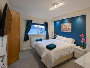 En eller flere senge i et værelse på Afallon