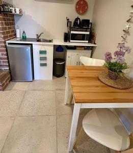 Kuchyň nebo kuchyňský kout v ubytování The Cosy Bungalow + 13 fotografií